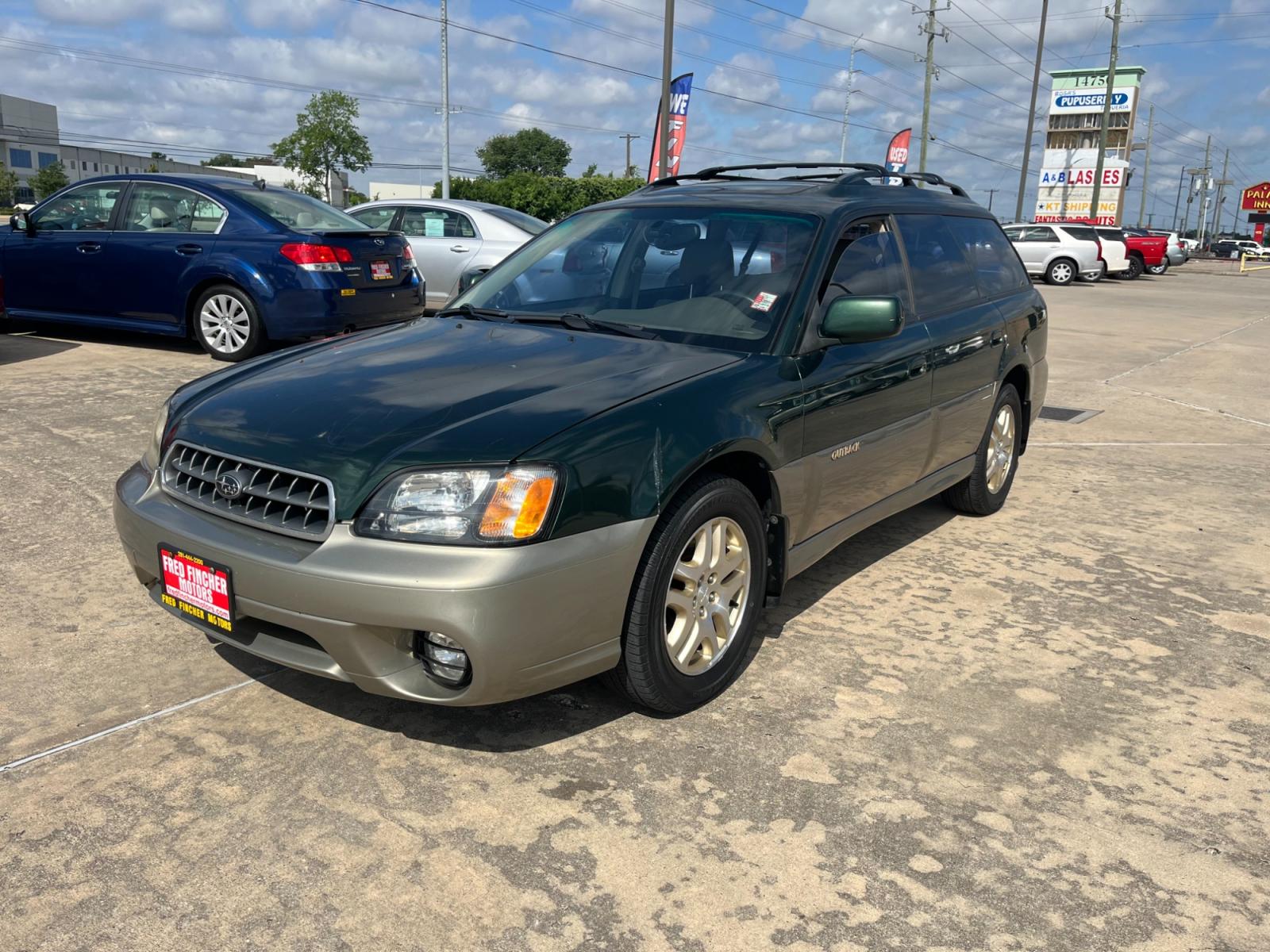 2003 green /TAN Subaru Outback Limited Wagon (4S3BH686737) with an 2.5L H4 SOHC 16V engine, 5-Speed Manual Overdrive transmission, located at 14700 Tomball Parkway 249, Houston, TX, 77086, (281) 444-2200, 29.928619, -95.504074 - Photo #2